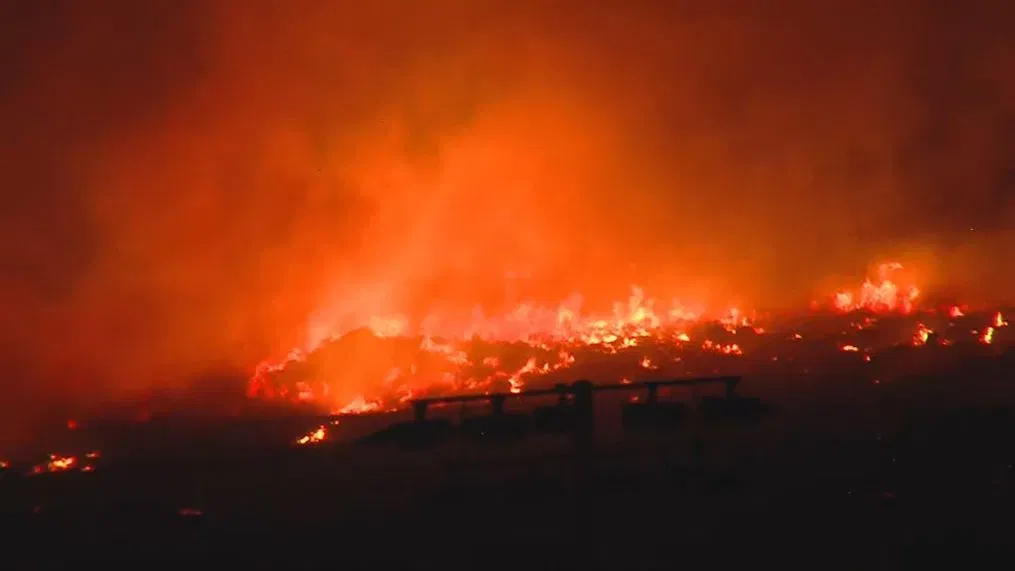 brush fire near Hug High School